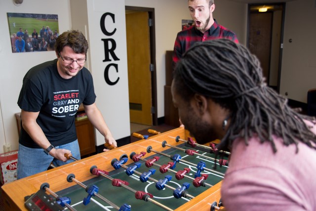Playing a game of foosball up at the CRC in-between classes