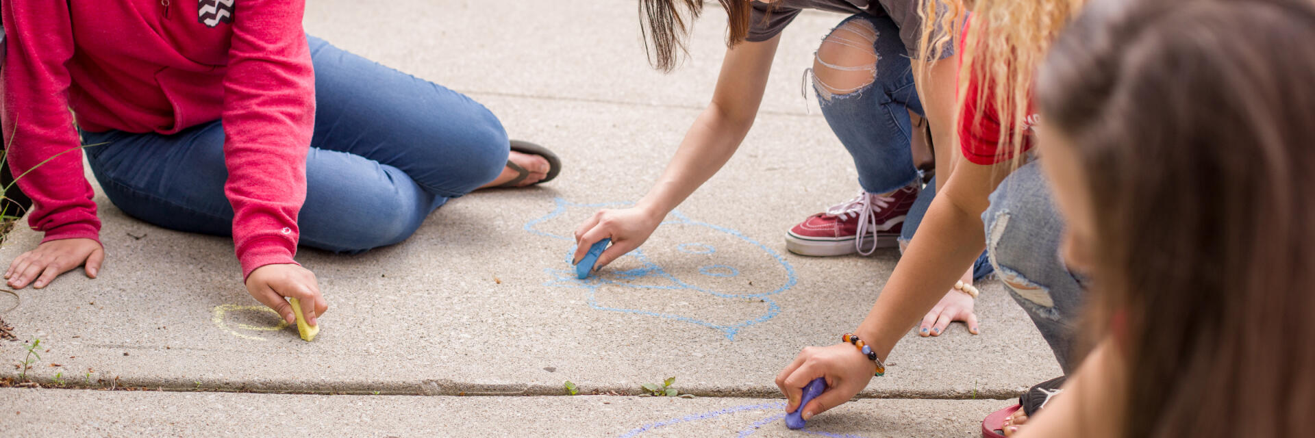 Students coloring with chalk