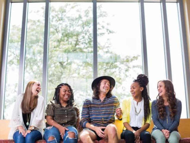 Students sitting on a bench